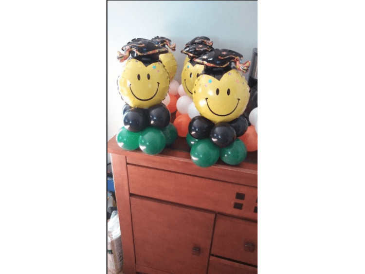 Grad Smiley Balloon Centerpieces