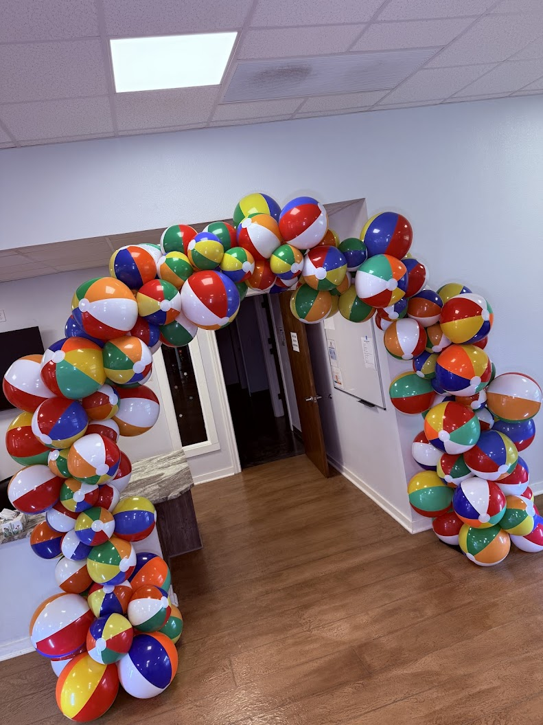 Colorful balloon arch created by Balloon Man for balloon decor in Canyon Lake