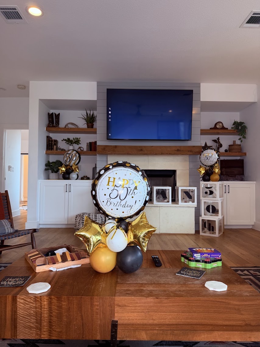 Gold birthday balloon decor by Balloon Man