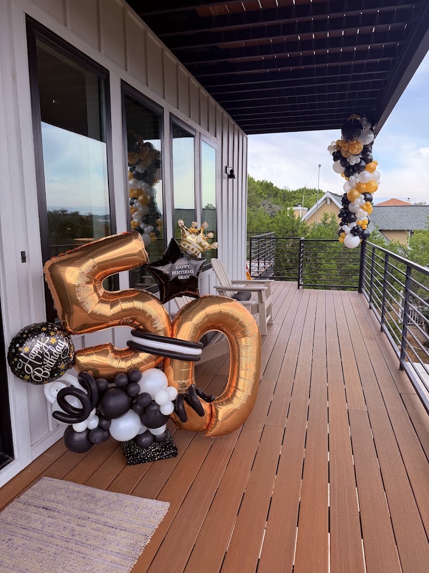 Elegant gold birthday balloon arrangement