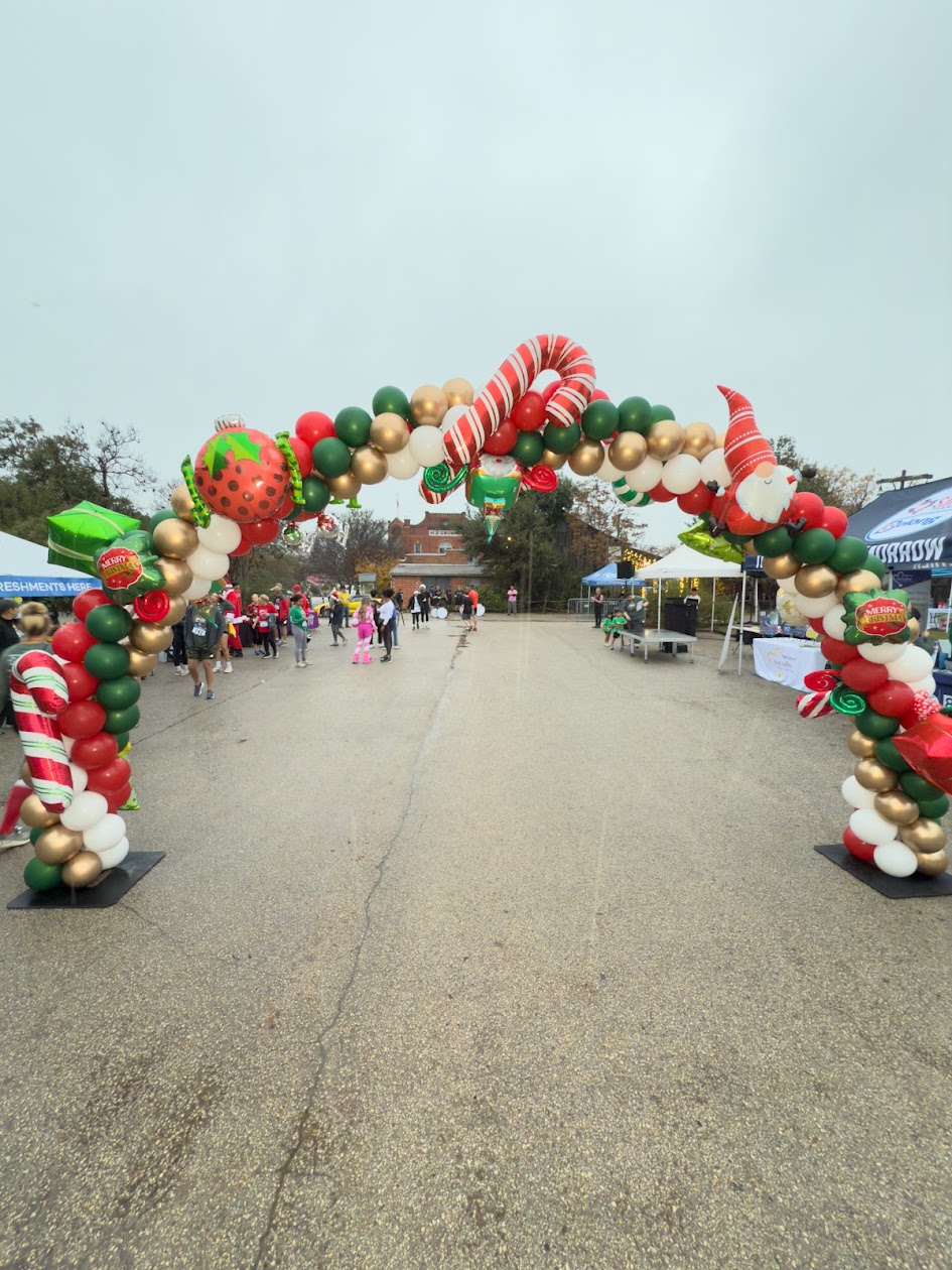 Holiday balloon decor in Bulverde with a Christmas balloon arch