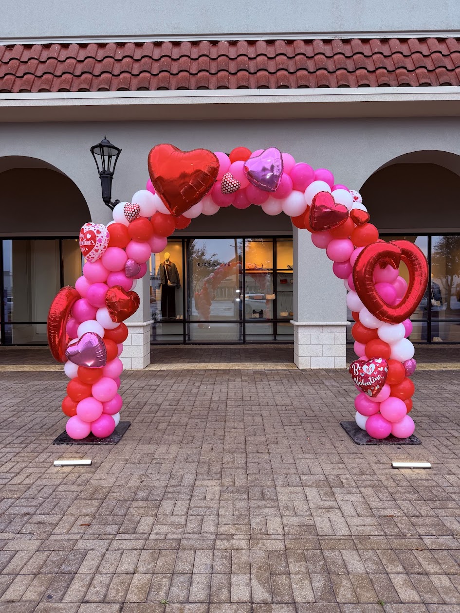 Heart shaped balloon arch for a Valentine celebration
