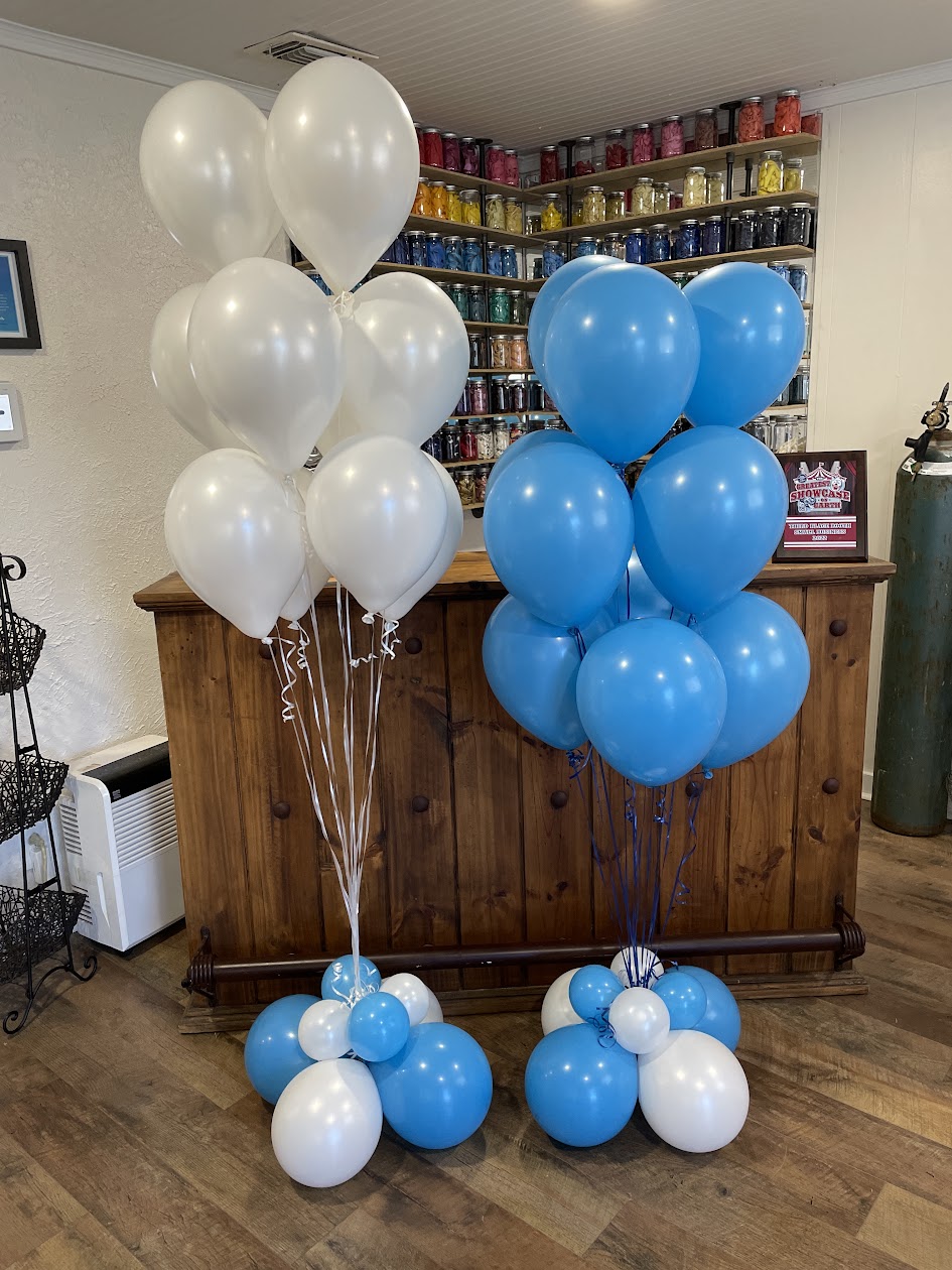 Colorful helium balloon arrangement by Balloon Man