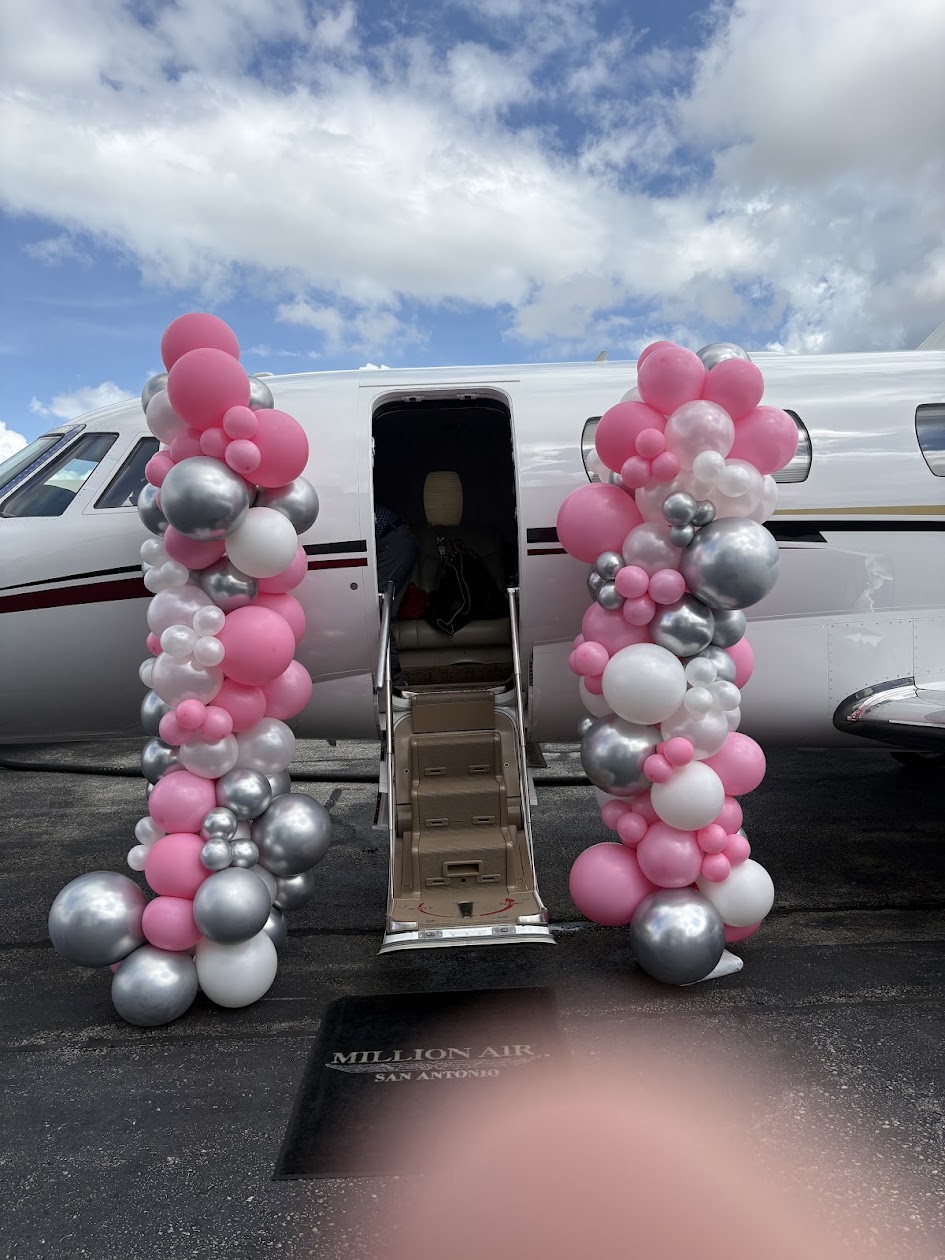 Pink birthday balloon decor created by Balloon Man